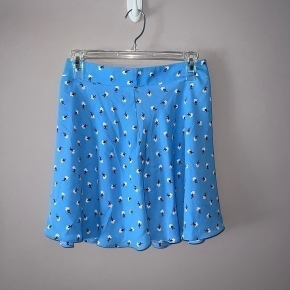 Light blue skirt with white flower design socialite size small